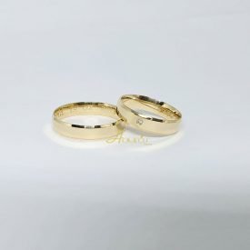Par de Alianças Ouro 18k Chanfrada 5mm  8 gramas 1 Brilhante